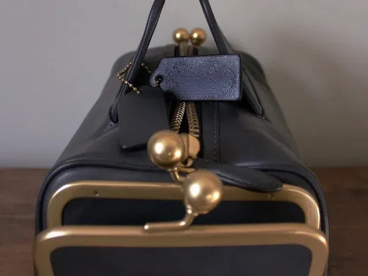 The Double Entry Satchel Bag