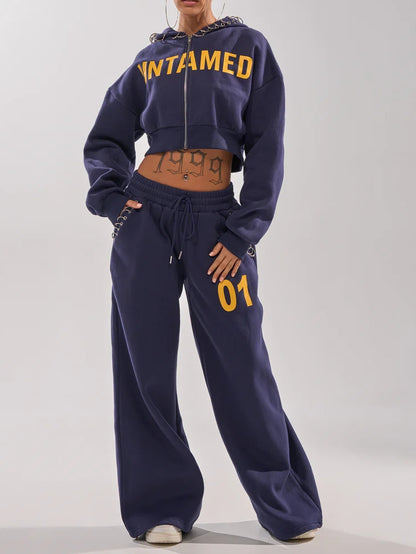 UNTAMED METAL RING SWEATSHIRT AND JOGGER