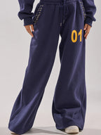 UNTAMED METAL RING SWEATSHIRT AND JOGGER