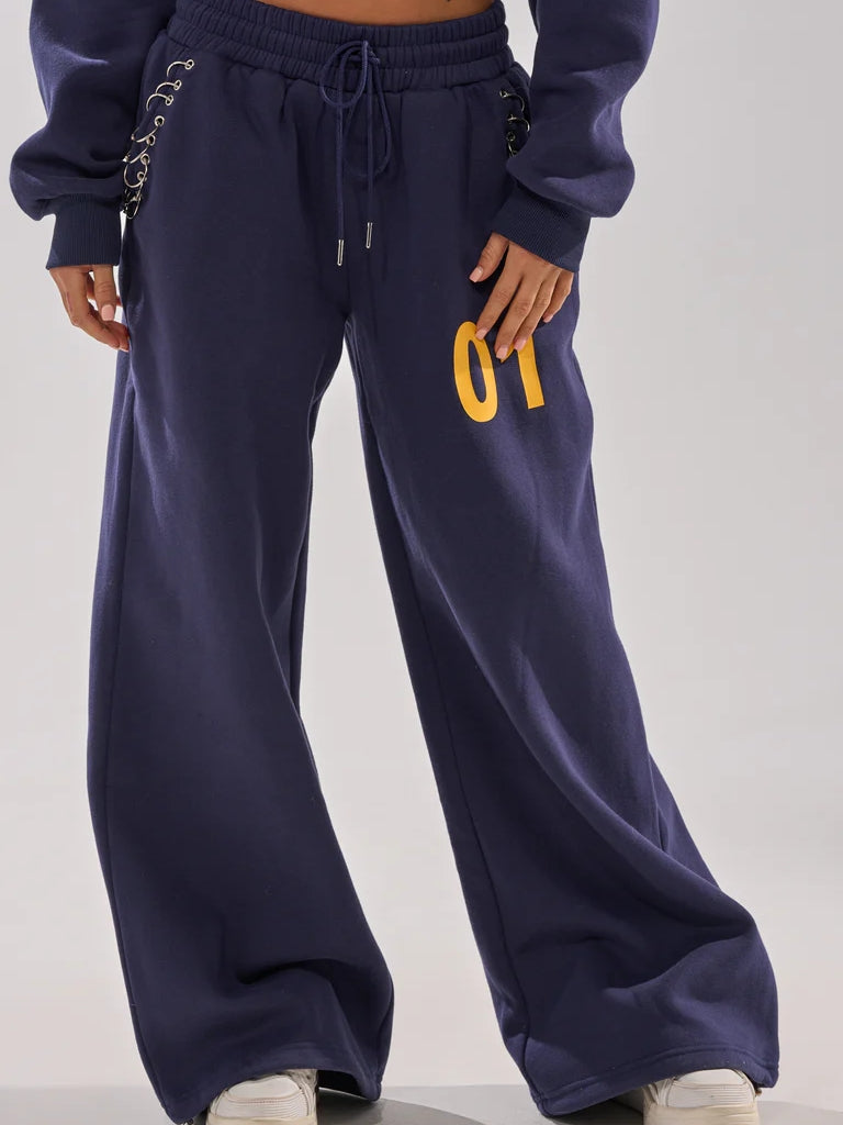 UNTAMED METAL RING SWEATSHIRT AND JOGGER