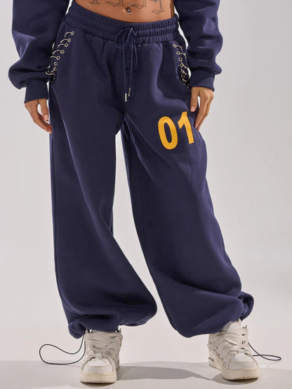 UNTAMED METAL RING SWEATSHIRT AND JOGGER